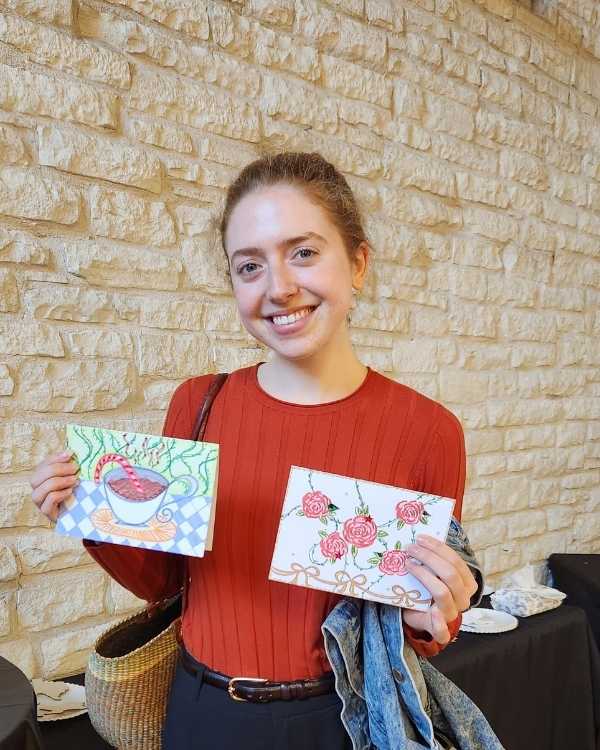 Helen, a mail-in cardmaker in Portland, making bird-illustrated cards at home