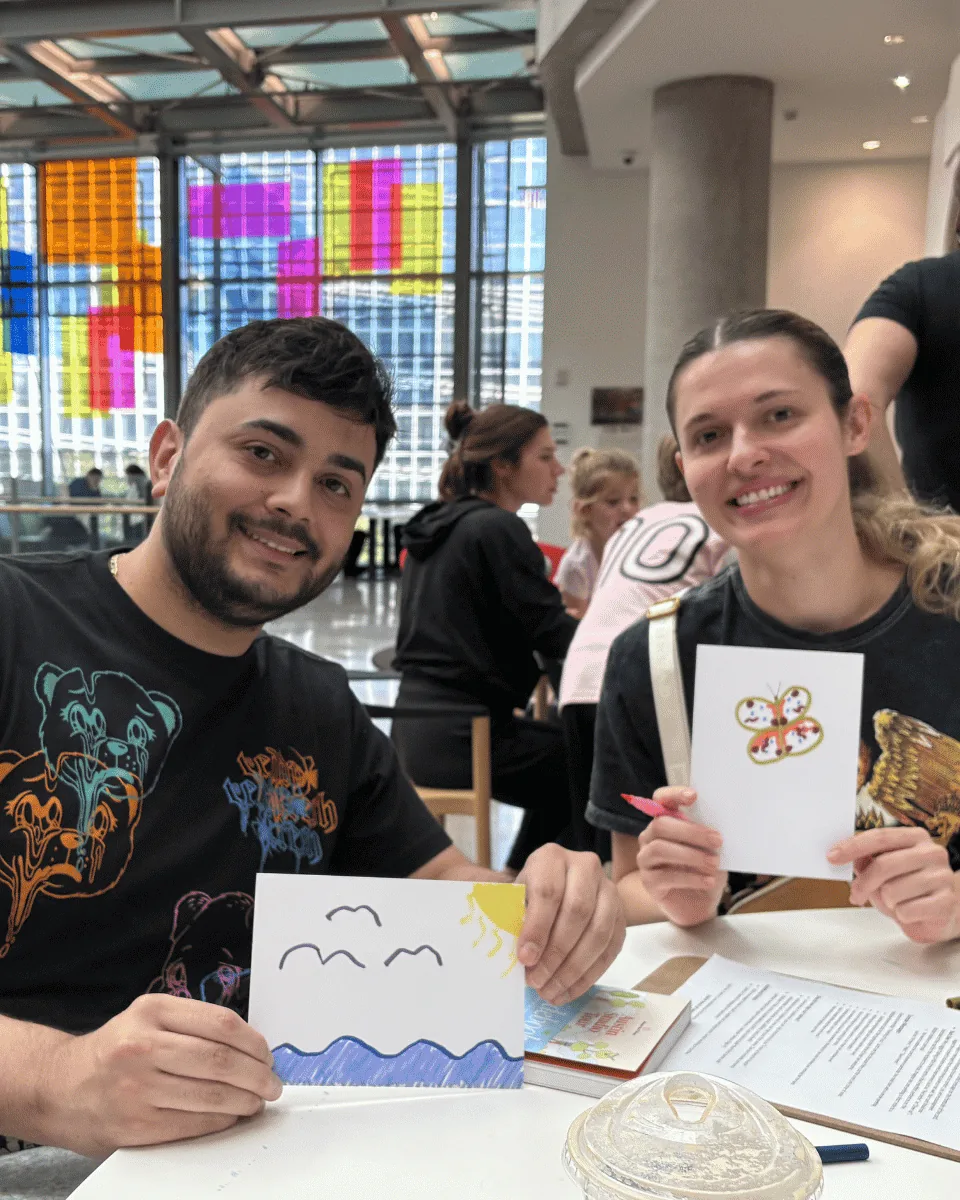 A participant making cards at the Austin Public Library Hello by Hand pop-up